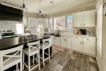 You`ll love the kitchen It has all new appliances that perfectly match the rest of the house. Cooking and entertaining will be a joy with these modern upgrades